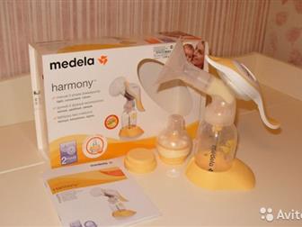  medela garmony   calma ,        ,               