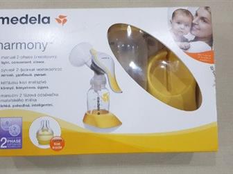 Телефон супруги Юлии,  Молокоотсосом почти не пользовались, Молокоотсос Medela Harmony ручной с технологией двухфазного сцеживания грудного молока,  Воспроизводит в Северодвинске