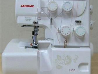   Janome 210D,          