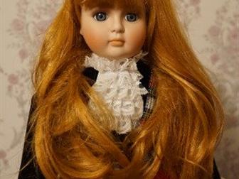    ALBERON      Scottish doll by Alberon from UK is a hand pointed porcelain doll with bright blue eyes,  